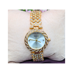 Montre femme GUCCI dorée blanc 1