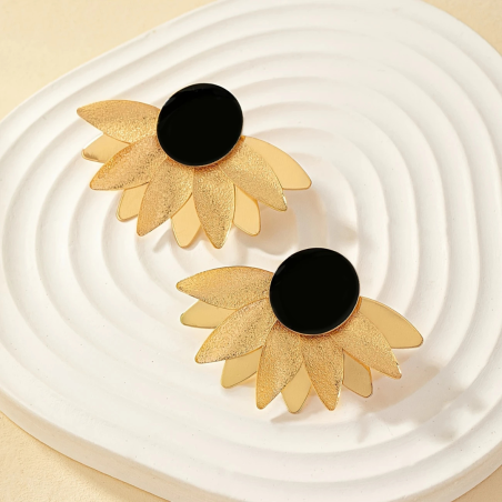Bijou unique rond noir avec accents en forme de feuille