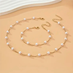 Ensemble collier + bracelet en perles - Doré
